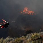 Firefighters race to contain LA wildfires as winds expected to pick up | Climate Crisis News